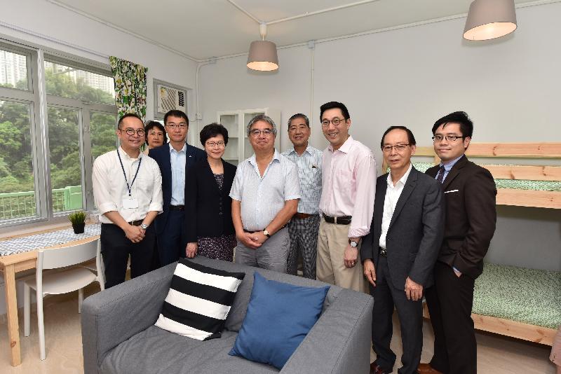 The Chief Secretary for Administration, Mrs Carrie Lam, visits the Empowerment Housing project in Sham Tseng run by the social enterprise Light Be today (July 14). Pictured (from left) are the Founder and Chief Executive Officer of Light Be, Mr Ricky Yu; the District Officer (Tsuen Wan), Miss Jenny Yip; the Deputy Chairman of Chun Wo Development Holdings Limited, Mr Derrick Pang; Mrs Lam; the Chairman of Chow Tai Fook Charity Foundation, Mr Peter Cheng; the Chairman of the Tsuen Wan District Council, Mr Chung Wai-ping; the Chairman of Light Be, Mr Laurence Li; the Director of Chow Tai Fook Charity Foundation, Mr Koo Tong-fat; and the Assistant District Officer (Tsuen Wan), Mr Patrick Chong, in a Light Home.
