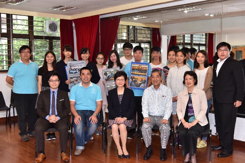 The Chief Secretary for Administration, Mrs Carrie Lam, visits Tsuen Wan District today (July 14) and meets with the youths of the Tsuen Wan District Youth Corps. Joining her are the Assistant District Officer (Tsuen Wan), Mr Patrick Chong (front row, first left); the Vice Chairman of Tsuen Wan District Council, Mr Wong Wai-kit (front row, second left); the Chairman of Tsuen Wan District Council, Mr Chung Wai-ping (front row, second right); and the District Officer (Tsuen Wan), Miss Jenny Yip (front row, first right).

