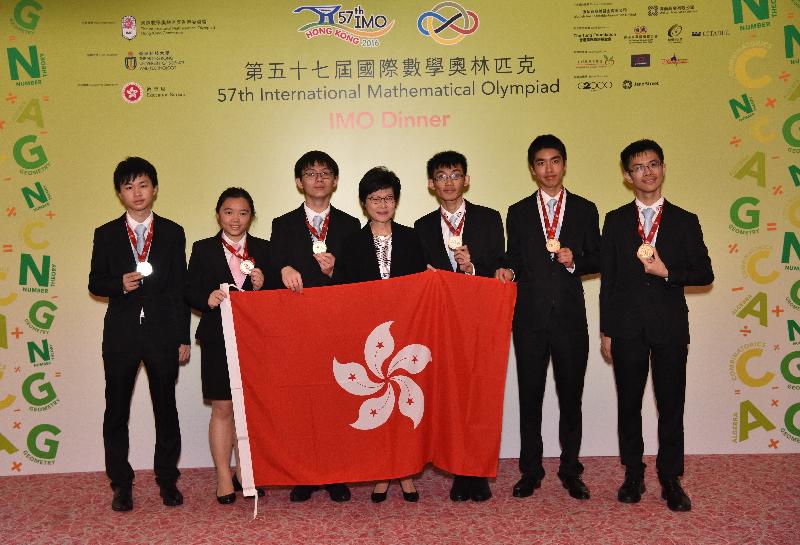 The Chief Secretary for Administration, Mrs Carrie Lam (centre), is pictured at the 57th International Mathematical Olympiad Closing Dinner this evening (July 15) with students of the Hong Kong team, Leung Yui-hin (first left), Kwok Man-yi (second left), Lee Shun-ming (third left), Cheung Wai-lam (third right), John Michael Wu (second right) and Yu Hoi-wai (first right).