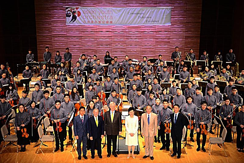 The Chief Secretary for Administration, Mrs Carrie Lam, attended the 26th Asian Youth Orchestra (AYO) Summer Festival opening ceremony at the Hong Kong Academy for Performing Arts today (July 18). Mrs Lam (front row, third right) is pictured in a group photo with the Founder, Artistic Director and Conductor of the AYO, Mr Richard Pontzious (front row, third left); the AYO Board Chairman, Mr James Thompson (front row, second left); the Consul-General of Japan in Hong Kong, Mr Kuninori Matsuda (front row, second right); the Consul-General of the Republic of Singapore in Hong Kong, Mr Jacky Foo (front row, first left); the Director, Corporate Affairs of Cathay Pacific Airways, Mr Arnold Cheng (front row, first right); and members of the AYO.