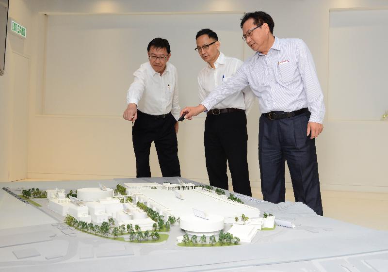 The Secretary for the Civil Service, Mr Clement Cheung (centre), is briefed by the Director of Drainage Services, Mr Edwin Tong (left), and the Chief Engineer (Sewage Treatment), Mr Chui Wai-sing (right), on the operation of the Stonecutters Island Sewage Treatment Works today (July 22).