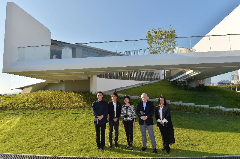 The Chief Secretary for Administration and Chairman of the Board of the West Kowloon Cultural District (WKCD) Authority, Mrs Carrie Lam (centre); the Managing Director of VPANG Architects Limited, Mr Vincent Pang (second left); the Chief Executive Officer of the WKCD Authority, Mr Duncan Pescod (second right); the Executive Director of M+ (designate), Ms Suhanya Raffel (first right); and the Acting Director of M+, Mr Doryun Chong (first left), at M+ Pavilion, WKCD today (July 22).