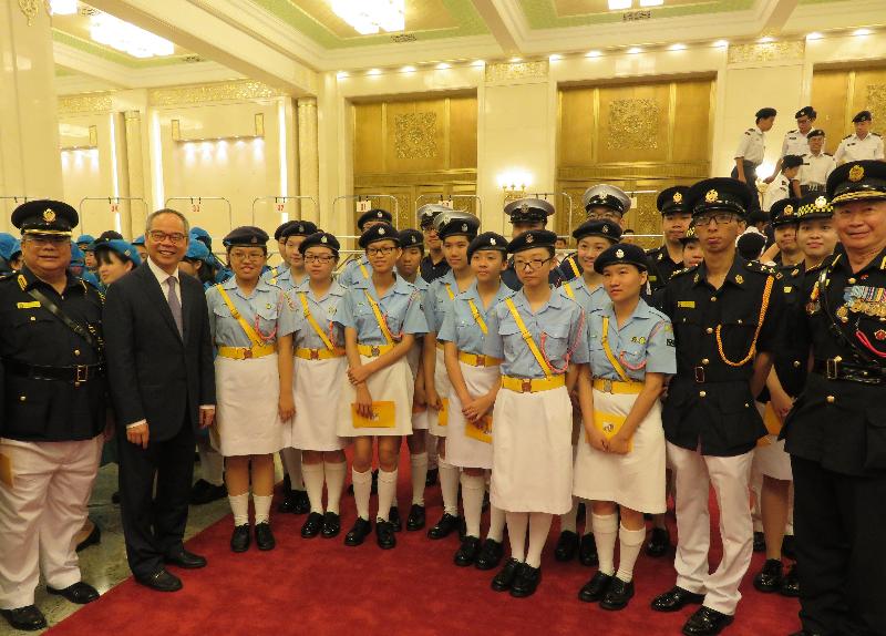 Representatives of Hong Kong uniformed youth groups are pictured with the Secretary for Home Affairs, Mr Lau Kong-wah (second left), after being received by the Vice-President, Mr Li Yuanchao, at the Great Hall of the People in Beijing today (July 25).