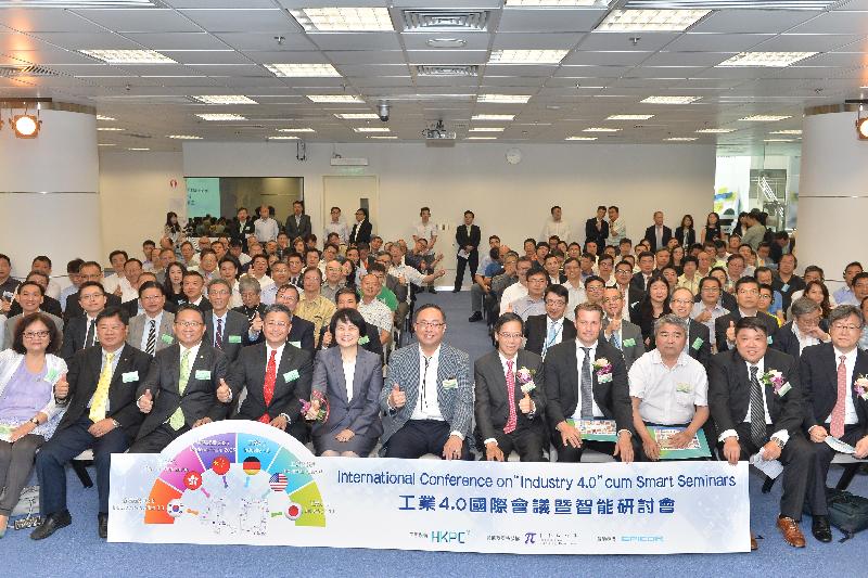 The Secretary for Innovation and Technology, Mr Nicholas W Yang (front row, centre); the Acting Chairman of the Hong Kong Productivity Council (HKPC), Mr Victor Ng (front row, fifth right); the Executive Director of the HKPC, Mrs Agnes Mak (front row, fifth left); and the Chairman of Federation of Hong Kong Industries, Professor Daniel Cheng (fourth left), join a group photo with speakers, guests and participants at the International Conference on Industry 4.0 cum Smart Seminars today (July 26).