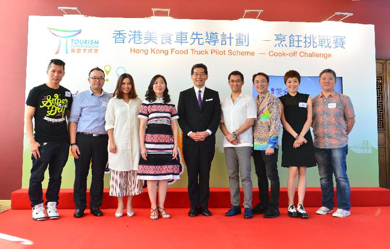 The Secretary for Commerce and Economic Development, Mr Gregory So (centre), and the Commissioner for Tourism, Miss Cathy Chu (fourth left), are pictured with the selected applicants in the Western category and the Selection Panel members at the Result Announcement Ceremony of the Cook-off Challenge of the Food Truck Pilot Scheme in the Chinese Culinary Institute today (July 27).