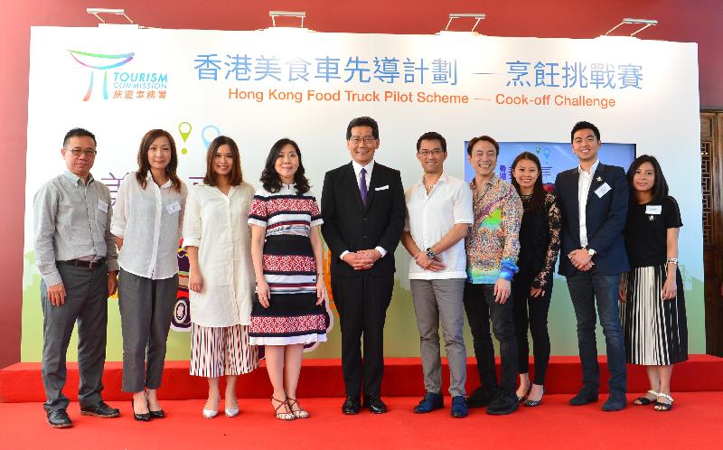 The Secretary for Commerce and Economic Development, Mr Gregory So (fifth left), and the Commissioner for Tourism, Miss Cathy Chu (fourth left), are pictured with the selected applicants in the International category and the Selection Panel members at the Result Announcement Ceremony of the Cook-off Challenge of the Food Truck Pilot Scheme in the Chinese Culinary Institute today (July 27).