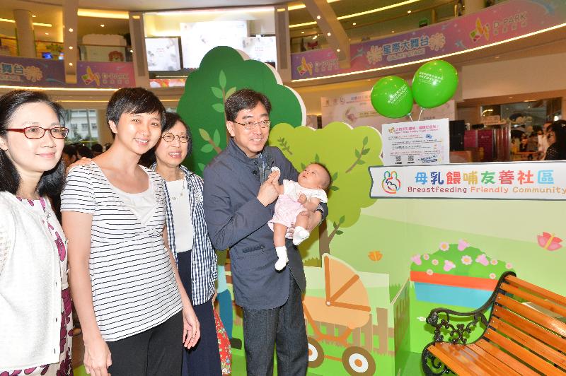 The Secretary for Food and Health, Dr Ko Wing-man (first right); the Under Secretary for Food and Health, Professor Sophia Chan (second right); and the Deputy Director of Health, Dr Cindy Lai (first left), today (July 30) tour a promotional booth on fostering breastfeeding-friendly workplaces and a breastfeeding-friendly community at an event to celebrate World Breastfeeding Week 2016.