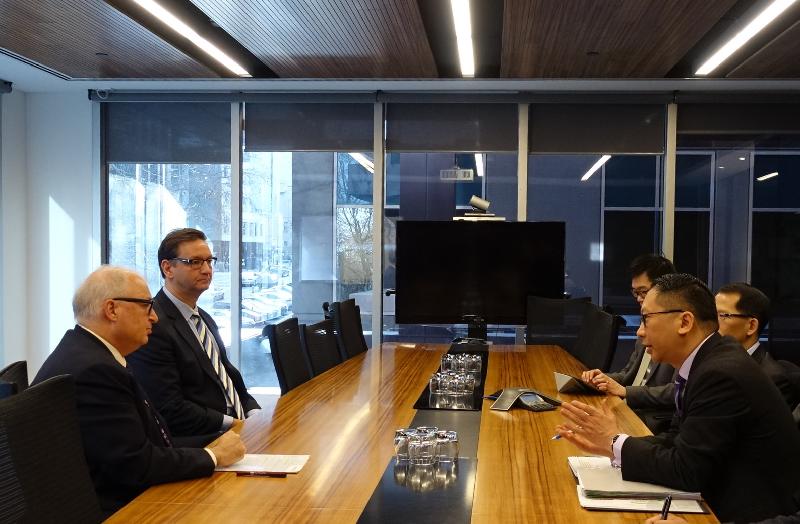 The Secretary for Justice, Mr Rimsky Yuen, SC, started his visit to Melbourne, Australia, today (August 12). Photo shows Mr Yuen (first right) meeting with the Dean of the Faculty of Law, Monash University, Professor Bryan Horrigan (first left), and Professor Jonathan Clough of the Faculty of Law, Monash University (second left).