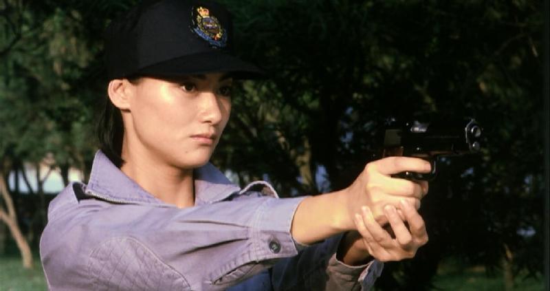 A film still of "The Inspector Wears Skirts" (1988).