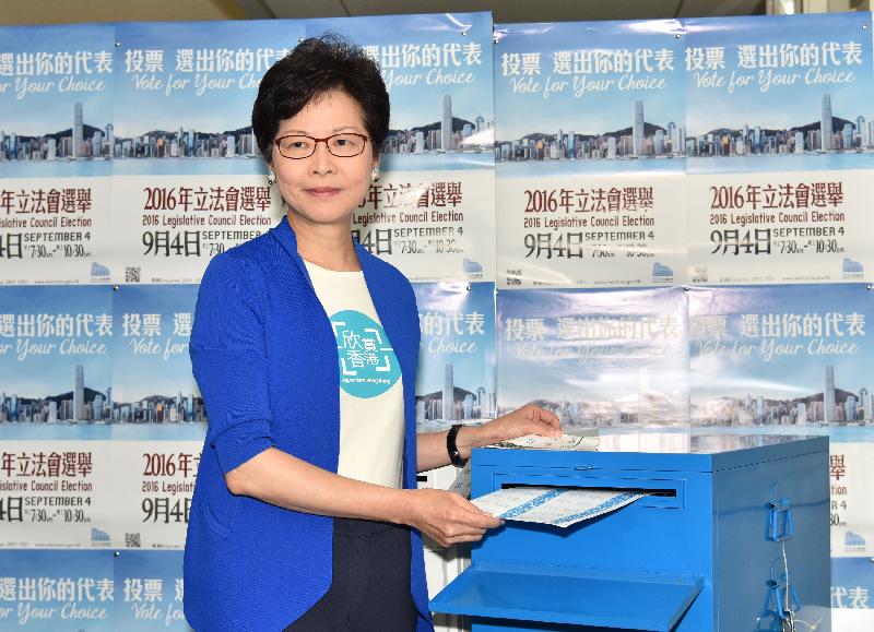 The Chief Secretary for Administration, Mrs Carrie Lam, casts her votes in the 2016 Legislative Council General Election at the German Swiss International School Peak Campus this morning (September 4).