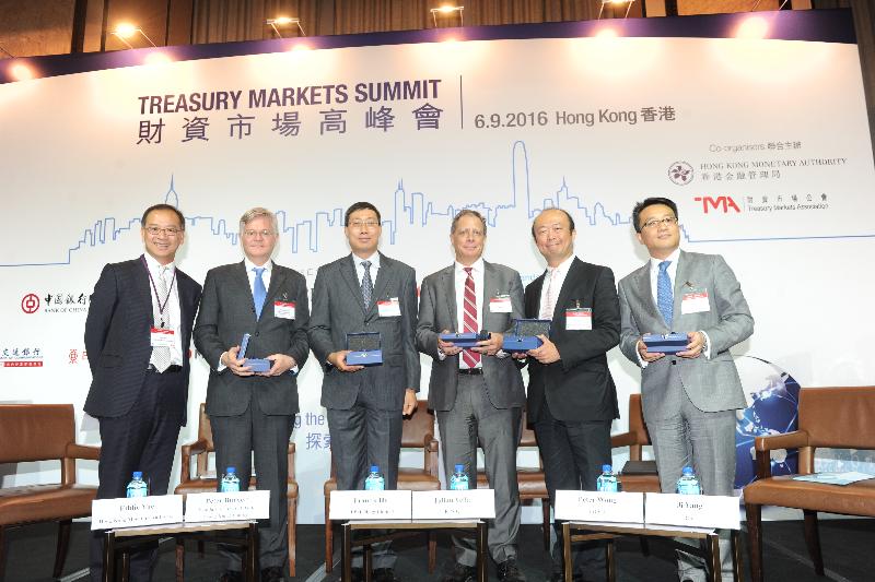 The Treasury Markets Summit 2016, jointly organised by the Hong Kong Monetary Authority (HKMA) and the Treasury Markets Association, was held today (September 6) in Hong Kong. The Deputy Chief Executive of the HKMA and Director of the Infrastructure Financing Facilitation Office, Mr Eddie Yue (first left), shared his views on sharpening Hong Kong's unique edge in the Belt and Road Initiative. Joining him on the panel discussion were the Managing Director and Regional Head of Corporate Finance, Greater China and North Asia, Standard Chartered Bank (Hong Kong) Limited, Mr Peter Burnett (second left); the Senior Director, Group Treasury & Project Finance, CLP Holdings Limited, Mr Francis Ho (third left); the ASPAC Head of Global Infrastructure, KPMG, Mr Julian Vella (third right); the Founding Chairman, International Association of CFOs and Corporate Treasurers (China), Mr Peter Wong (second right); and the Managing Director and Head of Corporate Sales and Structuring, Greater China, Citi, Mr Ji Yang (first right).