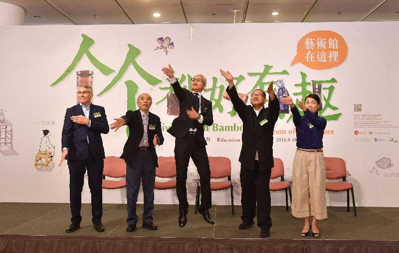The launch ceremony for the "Living with Bamboo: Museum of Art is Here" education programme and exhibition was held today (September 9) at the Hong Kong Central Library. Picture shows officiating guests at the launch ceremony flying bamboo dragonflies (from left): the Director of the Academy of Visual Arts of Hong Kong Baptist University, Professor John Aiken; the Chairman of the Sub-committee on Visual Arts of the Advisory Committee on Arts Development, Mr Vincent Lo; the Deputy Director of Leisure and Cultural Services (Culture), Dr Louis Ng; the Director of the Design and Cultural Studies Workshop, Mr Chiu Kwong-chiu; and the Museum Director of the Hong Kong Museum of Art, Miss Eve Tam.