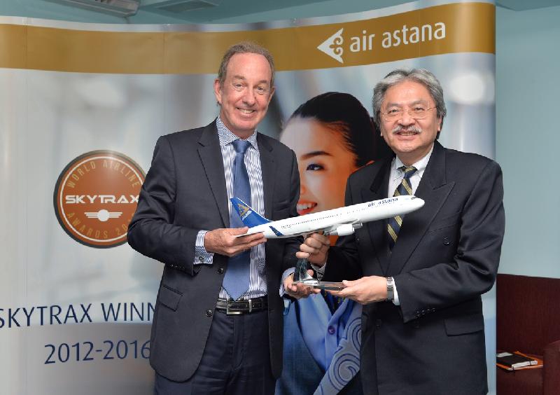The Financial Secretary, Mr John C Tsang (right), leading a business mission to Kazakhstan, meets with the President and Chief Executive Officer of Air Astana, Mr Peter Foster (left), in Almaty today (September 13).