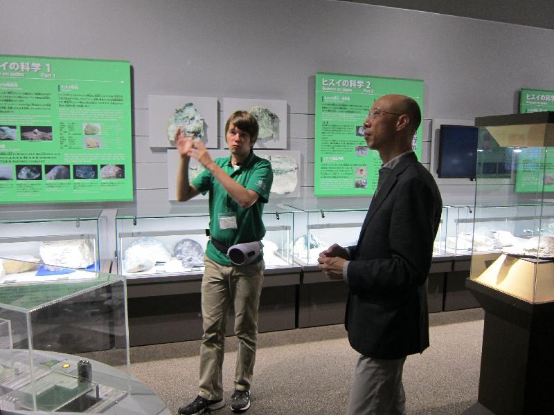 The Secretary for the Environment, Mr Wong Kam-sing, yesterday (September 13) visited Itoigawa UNESCO Global Geopark in Niigata Prefecture to share experiences in geopark management and promotion of natural landscape conservation. Picture shows Mr Wong (right) being briefed by a staff member during a visit to the Geopark's museum.