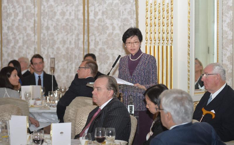 The Chief Secretary for Administration, Mrs Carrie Lam, delivers a speech at a luncheon organised by the Hong Kong Association in London yesterday (September 26, London time).

Also present were the Vice Chairman of the Hong Kong Association, Sir Henry Keswick (first right); the Group Chief Executive of the HSBC Holdings plc, Mr Stuart Gulliver (fourth right); the Special Representative for Hong Kong Economic and Trade Affairs to the European Union, Ms Shirley Lam (third right); and the Deputy Chairman of Hutchison Whampoa (Europe) Ltd, Mr Christian Salbaing (second right).