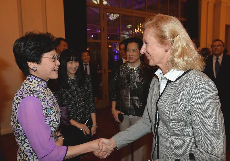 The Chief Secretary for Administration, Mrs Carrie Lam (left), is greeted by State Secretary of the Hessian Ministry of Finance, Germany, Dr Bernadette Weyland , at the "Think Asia, Think Hong Kong" gala dinner hosted by the Hong Kong Trade Development Council yesterday evening (September 27, Frankfurt time).
