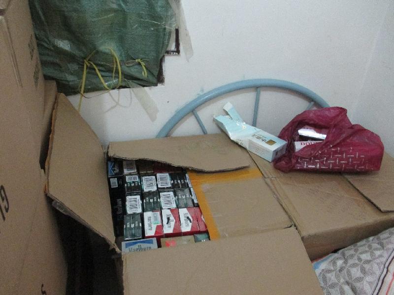 Hong Kong Customs today (September 28) smashed a suspected illicit cigarette storehouse in Sha Tin. Photo shows some of the suspected illicit cigarettes seized.