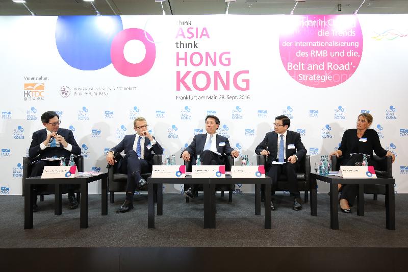 The Chief Executive of the Hong Kong Monetary Authority, Mr Norman Chan (first left), leads the panel discussion at the seminar "China opportunities: The Trends of RMB Internationalisation and Belt and Road Strategy" on September 28 (Frankfurt time). Panel members include (from second left): the Senior Managing Director, Macquarie Infrastructure and Real Assets, Mr Steve Gross; the Regional Chief Executive Officer, Greater China and North Asia, Standard Chartered Bank (Hong Kong) Ltd, Mr Benjamin Hung; the Executive Director and Chief Risk Officer, Bank of China (Hong Kong) Ltd, Mr Li Jiuzhong; and the Chief Financial Officer Global Growth Europe, Manager Investor Relations, General Electric, Ms Gerrit Schneider.