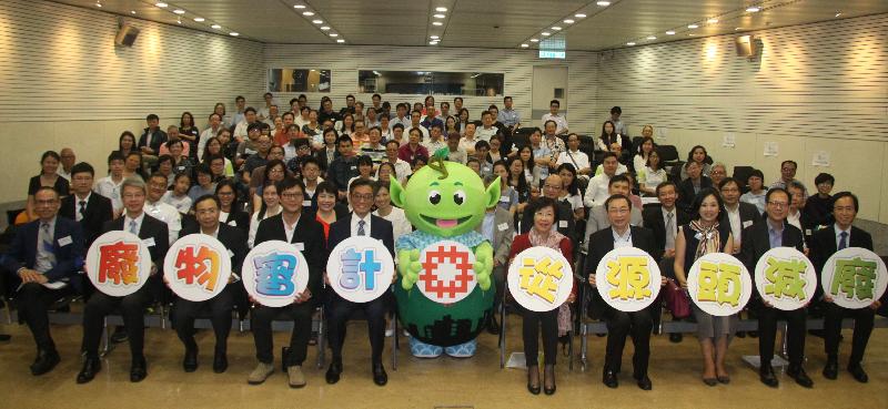 The Permanent Secretary for Transport and Housing (Housing) and Director of Housing, Mr Stanley Ying (front row, fifth left); the mascot, Green Junior (centre); the Governor of Friends of the Earth (HK), Mr James Wong (front row, fourth right); the Chief Executive of the Conservancy Association, Mr Ken So (front row, fourth left); and the Chief Executive Officer of the Business Environment Council, Mrs Christine Cheung (front row, third right); together with estate resident representatives at the ceremony to launch "Green Delight in Estates" Phase 10 today (October 7).