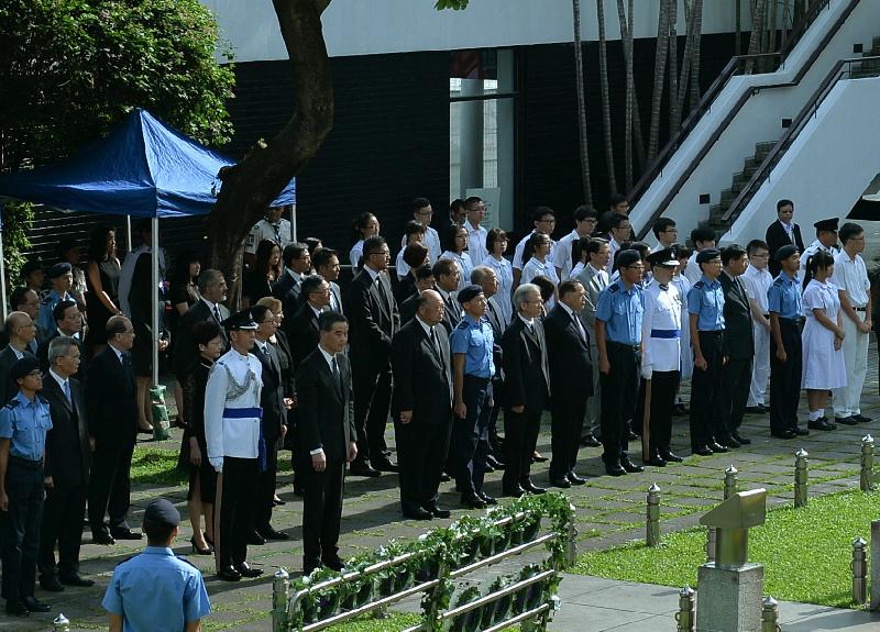 The Chief Executive, Mr C Y Leung, this morning (October 9) attended an official ceremony to commemorate those who died in the defence of Hong Kong between 1941 and 1945 at the Hong Kong City Hall Memorial Garden. Photo shows attendees at the ceremony: Deputy Director of the Liaison Office of the Central People's Government in the HKSAR Mr Huang Lanfa (second row, second left); the Chief Secretary for Administration, Mrs Carrie Lam (second row, third left); The Secretary for Justice, Mr Rimsky Yuen (second row, forth left); Mr Leung (front row, second left); the Chief Justice of the Court of Final Appeal, Mr Geoffrey Ma Tao-li (front row, third left); the Convenor of the Non-official Members of the Executive Council, Mr Lam Woon-kwong (front row, fifth left) and Legislative Council member Mr Abraham Shek (front row, sixth left).