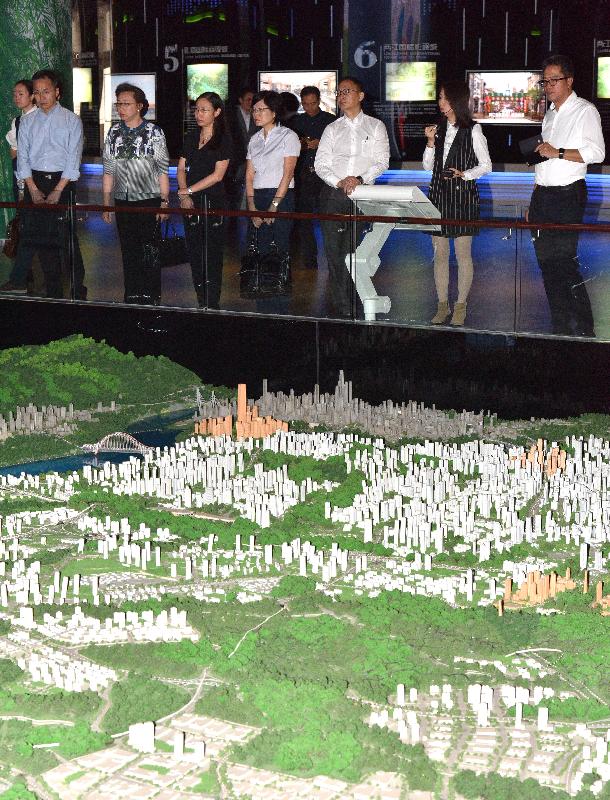 The Secretary for the Civil Service, Mr Clement Cheung, leading a delegation of Permanent Secretaries and Heads of Departments, toured the Chongqing Liangjiang New Area Planning Exhibition Hall today (October 20) and was briefed on the latest situation of the area. Photo shows (from left) the Commissioner of Customs and Excise, Mr Roy Tang; the Commissioner for Transport, Mrs Ingrid Yeung; the Permanent Secretary, Chief Executive's Office, Ms Alice Lau; the Permanent Secretary for Education, Mrs Marion Lai; and Mr Cheung. On the right is the Permanent Secretary for Development (Planning and Lands), Mr Michael Wong.