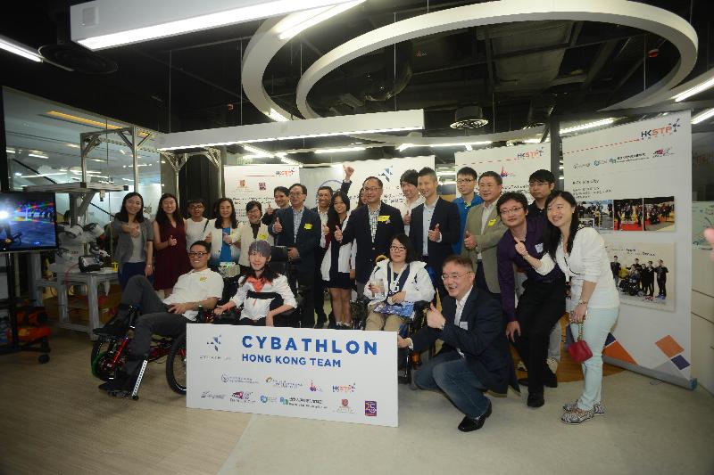The Secretary for Innovation and Technology, Mr Nicholas W Yang (eighth right, back row) ; the Permanent Secretary for Innovation and Technology, Mr Cheuk Wing-hing (fourth right, back row); the Commissioner for Innovation and Technology, Ms Annie Choi (fifth left, back row), and other officiating guests pose for a group photo with Cybathlon athletes at the InnoCarnival 2016 at Hong Kong Science Park today (October 29). At one of the booths, they learn how robotics assistive devices have helped the Cybathlon athletes with disabilities to achieve outstanding performance.