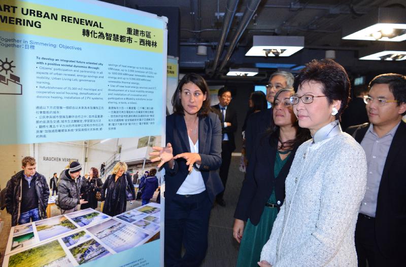 The Chief Secretary for Administration, Mrs Carrie Lam, attended the opening reception of the "City Smart - Development in Europe: Vienna" exhibition at City Gallery today (November 3). Photo shows Mrs Lam (second right) touring the exhibition.