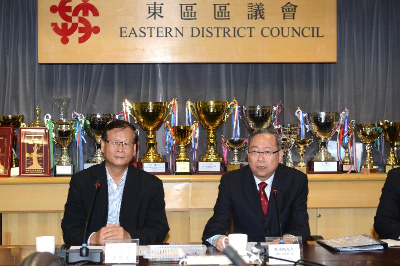The Secretary for Security, Mr Lai Tung-kwok, (right) visited Eastern District Council today (November 14) and met with the Chairman of Eastern District Council, Mr Wong Kin-pan (left), and District Councillors to exchange views on law and order matters and other community issues.