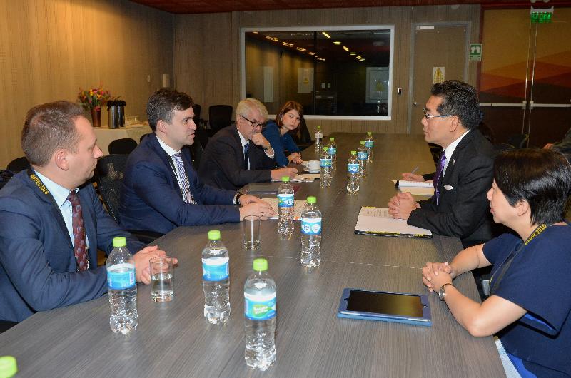 The Secretary for Commerce and Economic Development, Mr Gregory So (second right), holds a bilateral meeting with the Deputy Minister of Economic Development of Russia, Mr Stanislav Voskresensky (second left), on the sidelines of the 28th Asia-Pacific Economic Cooperation Ministerial Meeting in Lima, Peru, today (November 17, Lima time).