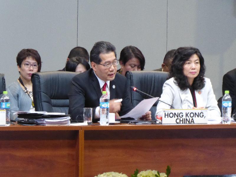 The Secretary for Commerce and Economic Development, Mr Gregory So (left), speaks at the plenary session on "Developing Human Capital" at the 28th Asia-Pacific Economic Cooperation (APEC) Ministerial Meeting in Lima, Peru, today (November 18, Lima time).
