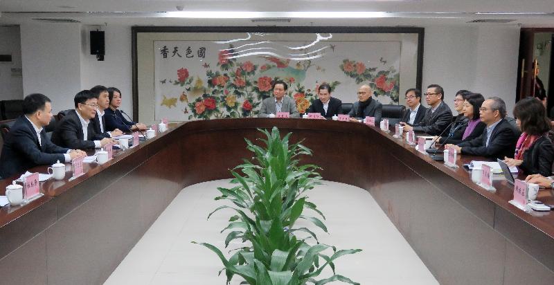 The Secretary for Home Affairs, Mr Lau Kong-wah, and a delegation of representatives from the Hong Kong Cantonese opera sector have visited Guangzhou and Foshan. Picture shows Mr Lau (second right) and representatives meeting with the Director General of the Department of Culture of Guangdong Province, Mr Fang Jianhong (second left), today (December 2) in Guangzhou.
