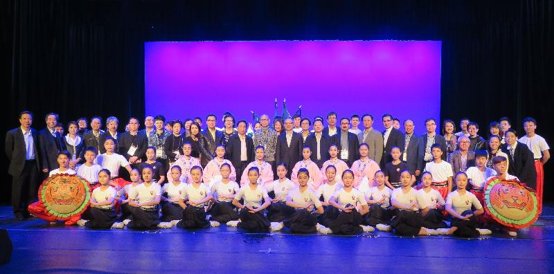 The Secretary for Home Affairs, Mr Lau Kong-wah, and a delegation of representatives from the Hong Kong Cantonese opera sector have visited Guangzhou and Foshan. Picture shows Mr Lau and representatives with students participating in a demonstration performance at the Guangdong Dance and Drama College on December 1.