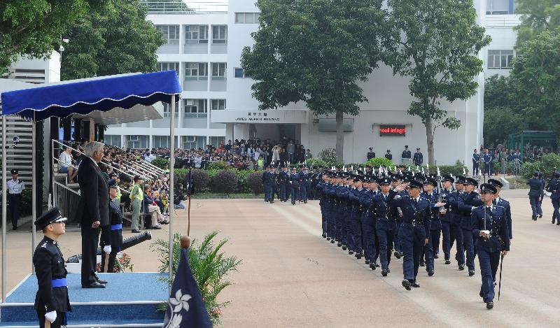 The Commissioner on Interception of Communications and Surveillance, Mr Azizul Rahman Suffiad, today (December 3) attends the passing-out parade held at Police College.