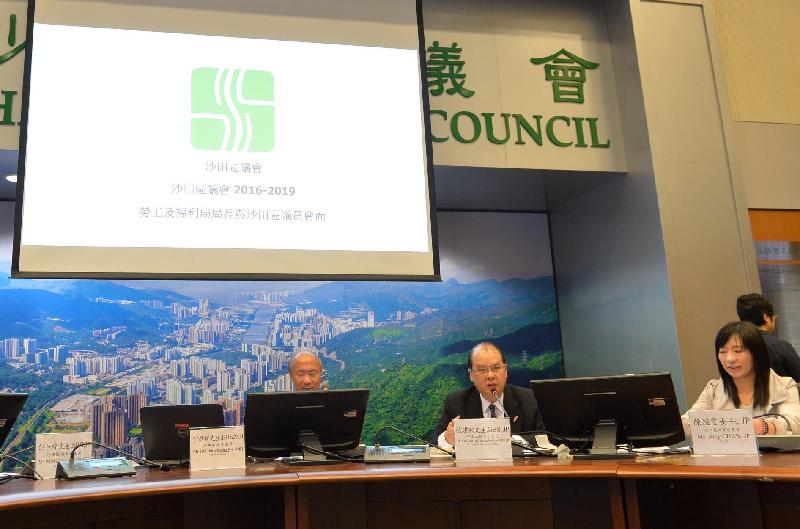The Secretary for Labour and Welfare, Mr Matthew Cheung Kin-chung (centre), attended a meeting with members of Sha Tin District Council today (December 5) to exchange views on issues of concern. Also pictured are the Chairman of Sha Tin District Council, Mr Ho Hau-cheung (left), and District Officer (Sha Tin), Miss Amy Chan (right).