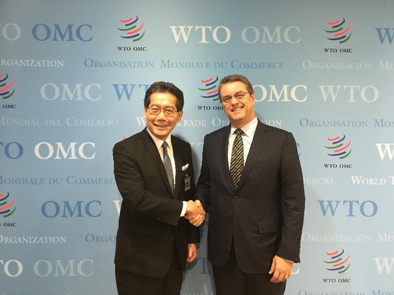The Secretary for Commerce and Economic Development, Mr Gregory So (left), yesterday (December 5, Geneva time) met with the Director General of the World Trade Organization, Mr Roberto Azevêdo, in Geneva to exchange views on the WTO's business.