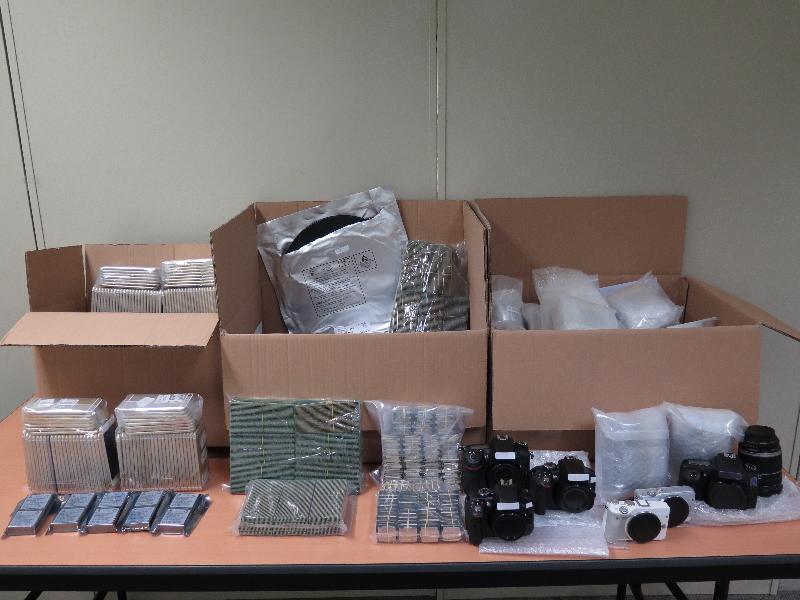 Hong Kong Customs yesterday (December 8) detected two suspected smuggling cases and seized a large haul of suspected smuggled electronic products with an estimated market value of about $15 million at Man Kam To Control Point.