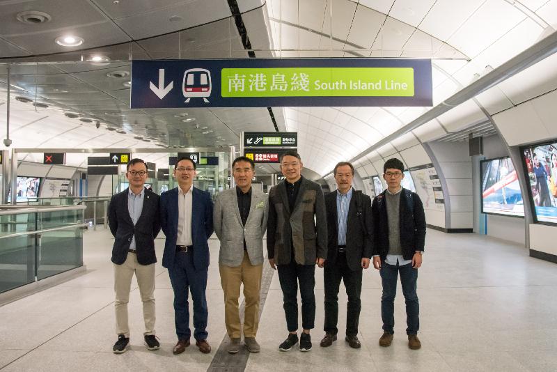 Legislative Council members (from left) Mr Chan Chi-chuen, Mr Wilson Or, Mr Michael Tien, Mr Paul Tse, Dr Fernando Cheung and Mr Nathan Law today (December 12) visit the MTR South Island Line (East).