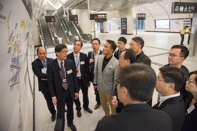 Legislative Council Members today (December 12) are briefed on the extension works and interchange arrangement at Admiralty Station by representatives of the MTR Corporation Limited.