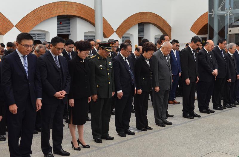 The Chief Executive, Mr C Y Leung, attended a ceremony for the Nanjing Massacre National Memorial Day at the Hong Kong Museum of Coastal Defence this morning (December 13). Photo shows (from left) the Acting Financial Secretary, Professor K C Chan; the Secretary for Justice, Mr Rimsky Yuen, SC; the Chief Secretary for Administration, Mrs Carrie Lam; the Chief of Staff of the Chinese People's Liberation Army Hong Kong Garrison, Mr He Qimao; the Deputy Commissioner of the Office of the Commissioner of the Ministry of Foreign Affairs of the People's Republic of China in the Hong Kong Special Administrative Region (HKSAR), Mr Hu Jianzhong; the Deputy Director of the Liaison Office of the Central People's Government in the HKSAR, Ms Yin Xiaojing; the Vice-Chairman of the National Committee of the Chinese People's Political Consultative Conference, Mr Tung Chee Hwa; Mr Leung; the Chief Justice of the Court of Final Appeal, Mr Geoffrey Ma Tao-li; the President of the Legislative Council, Mr Andrew Leung; the Convenor of the Non-official Members of the Executive Council, Mr Lam Woon-kwong; and other attendees observing two minutes' silence at the ceremony.