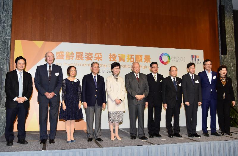 The Chief Secretary for Administration, Mrs Carrie Lam, attended the summit on "An Investment for the Celebration of Aging" summit today (December 13). Pictured from left are the Deputy Executive Director and Head of Public Policy of Our Hong Kong Foundation, Mr Stephen Wong; the Chairman of the Health Care Committee of Business and Professionals Federation of Hong Kong, Mr Michael Somerville; the Si Yuan Professor in Health and Social Work of the University of Hong Kong, Professor Cecilia Chan; the Chairman of the Hospital Authority, Professor John Leong; Mrs Lam; the Chairman of Our Hong Kong Foundation, Mr Tung Chee Hwa; the Director of the Jockey Club School of Public Health and Primary Care of the Chinese University of Hong Kong, Professor Yeoh Eng-kiong; the Secretary for Labour and Welfare, Mr Matthew Cheung Kin-chung; the Secretary for Food and Health, Dr Ko Wing-man; the Chairman of the Elderly Commission, Dr Lam Ching-choi; and the Executive Director of Our Hong Kong Foundation, Mrs Eva Cheng.