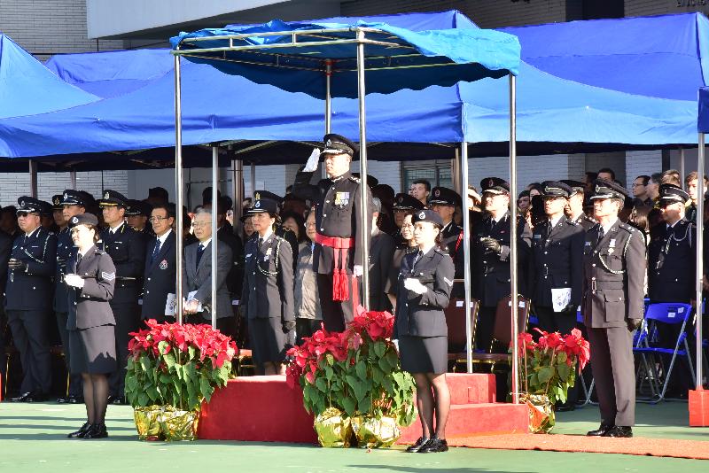 The Civil Aid Service (CAS) held the 77th Recruits Passing-out Parade at its headquarters today (December 18). Photo shows the Chief Staff Officer and Deputy Commissioner (Operations) of the CAS, Mr Lam Kwok-wah, taking the salute from the parade.