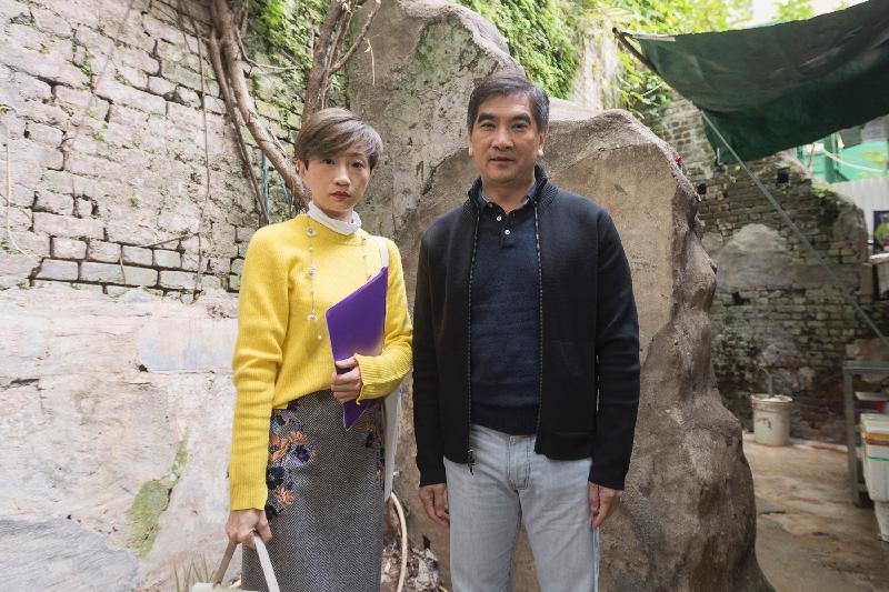 Members of the Legislative Council Mr Chung Kwok-pan (right) and Ms Tanya Chan (left) visit the historic tenement remains between Cochrane Street and Gutzlaff Street, Central, today (December 29).