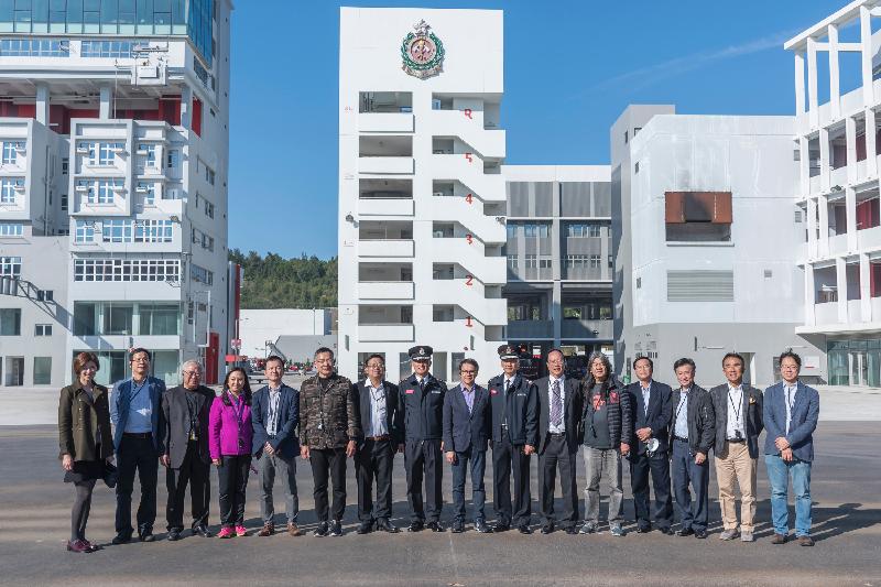 Legislative Council Panel on Security conducts a visit to the Fire and Ambulance Services Academy today (January 4) to better understand its training facilities and related training provided.    (From left) Ms Yung Hoi-yan; Mr Ip Kin-yuen; Mr Wong Ting-kwong; Dr Elizabeth Quat; Mr Chan Chi-chuen; Mr Paul Tse Wai-chun; Mr James To Kun-sun; Director of Fire Services Mr. Li Kin-yat; Mr Chan Hak-kan; Deputy Director of Fire Services, Mr. Leung Wai-hung; Mr Ma Fung-kwok; Mr Leung Kwok-hung; Mr Poon Siu-ping; Mr Yiu Si-wing; Mr Michael Tien Puk-sun; and Mr Charles Peter Mok. 