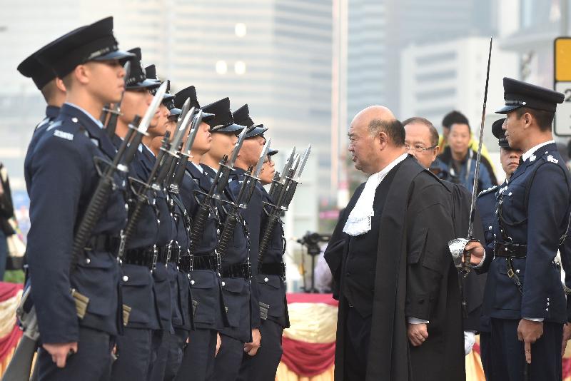 The Chief Justice of the Court of Final Appeal, Mr Geoffrey Ma Tao-li, inspects the guard of honour mounted by the Hong Kong Police Force at Edinburgh Place during the Ceremonial Opening of the Legal Year 2017 today (January 9).