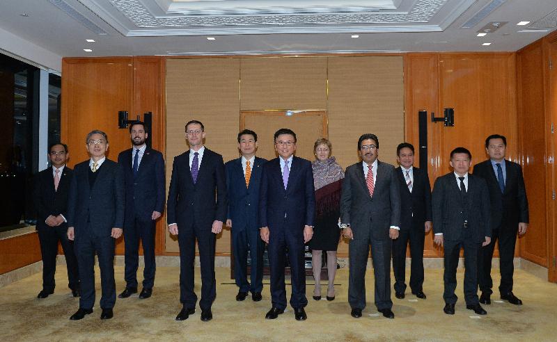 The Secretary for Financial Services and the Treasury, Professor K C Chan, hosted a dinner today (January 16) for policy-makers from nine economies for exchange on the potentials and risks of financial technologies in changing the financial landscape. Picture shows (front row, from left) the Under Secretary for Financial Services and the Treasury, Mr James Lau; Minister for National Economy of Hungary, Mr Mihály Varga; Professor Chan; Finance Minister II of Malaysia, Y.B Datuk Johari bin Abdul Ghani; and Vice Minister for Finance of Thailand, Mr Kiatchai Sophastienphong (back row, from left) Deputy Minister of Corporate, PENGGERAK and Economy, Brunei Darussalam, Dato Mohd Roselan Daud; Minister of State at the Department of Finance of Ireland, Mr Eoghan Murphy, TD; Vice Chairman for Financial Services Commission of Korea, Dr Jeong Eun-bo; First Deputy Governor of Bank of Russia, Ms Ksenia Yudaeva; Senior Deputy Governor of Bank Indonesia, Mr Mirza Adityaswara; and Under Secretary of State, Ministry of Economy and Finance of Cambodia, H.E. Dr Phan Phalla, at a group photo before dinner.