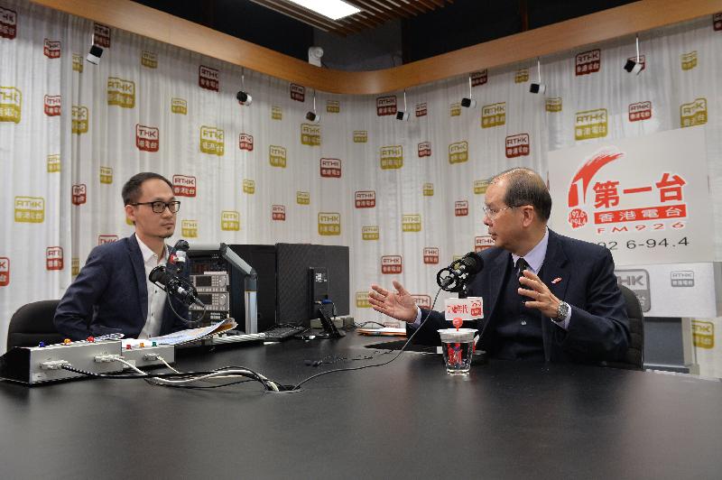 The Chief Secretary for Administration, Mr Matthew Cheung Kin-chung (right), attends Radio Television Hong Kong's "Talkabout" this morning (January 20).