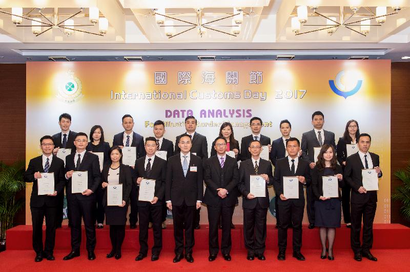 The Secretary for Justice, Mr Rimsky Yuen, SC (front row, fifth right) and the Commissioner of Customs and Excise, Mr Roy Tang (front row, fifth left) are pictured with Hong Kong Customs officers who were awarded the World Customs Organization Certificate of Merit at the 2017 International Customs Day reception today (January 20).
