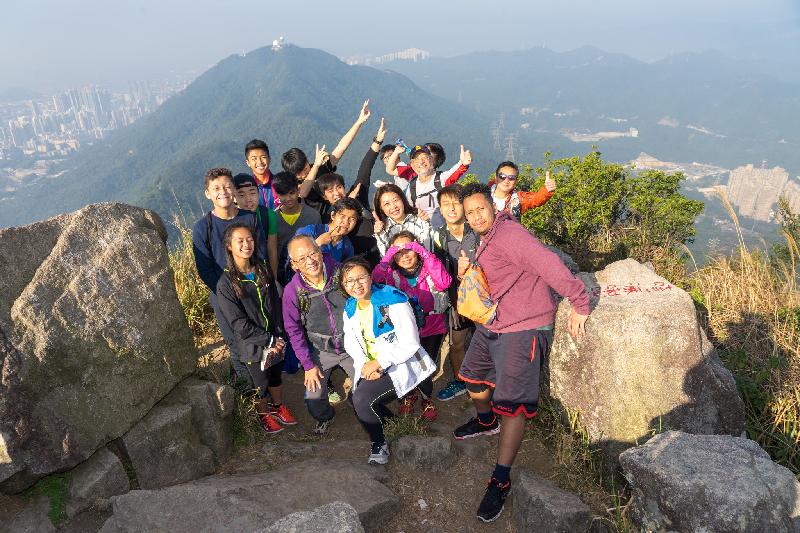 "Walk the Hong Kong Spirit" was launched on January 21. Photo shows the launch participants on top of Lion Rock.