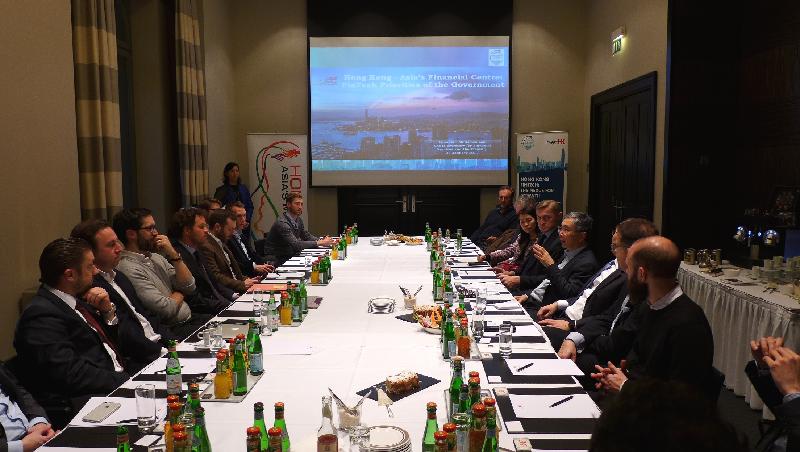 The Under Secretary for Financial Services and the Treasury, Mr James Lau (fourth right), speaks at a financial technology roundtable in Berlin on January 24 (Berlin time).