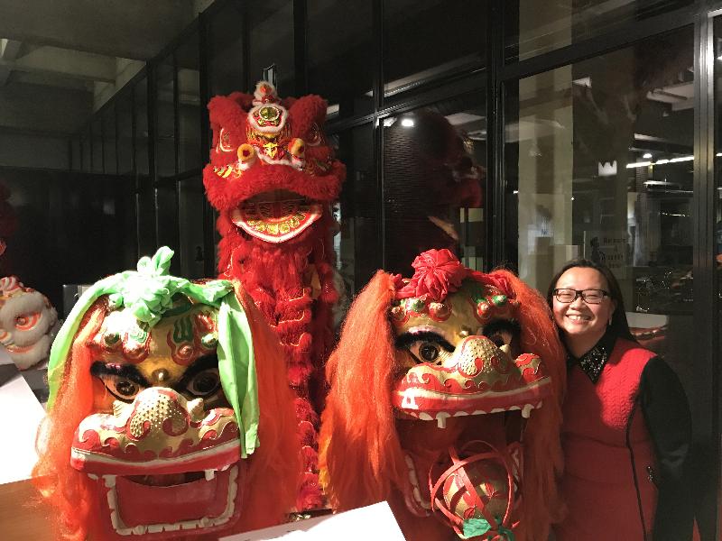 Deputy Representative of the Hong Kong Economic and Trade Office, Brussels, Miss Alice Choi, is pictured with some of the lion dance exhibits at the Legends of Lion Dance exhibition in Belgium on January 27.
